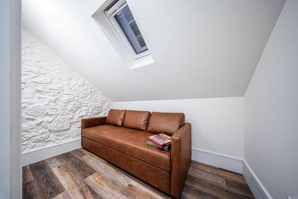 Studio, Patio, City View | Living area | TV