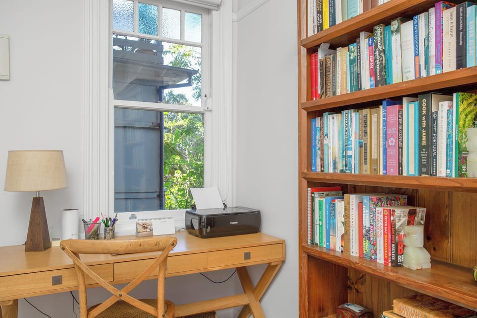 Those needing to set up their laptop can make use of a workstation with a printer within the second bedroom.