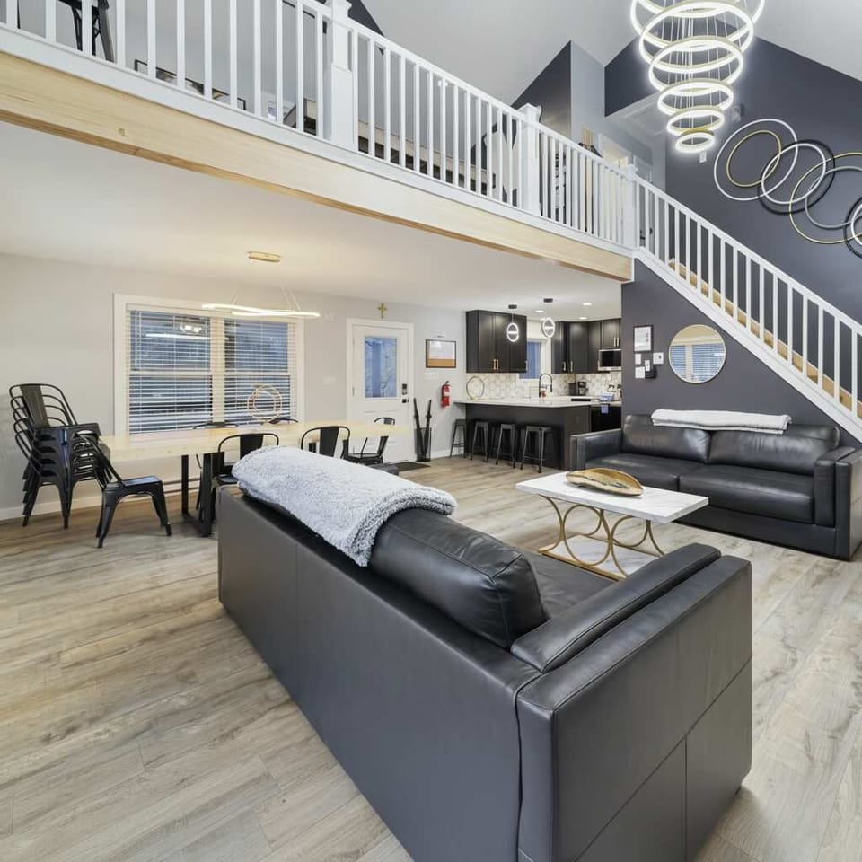 Cozy vibes, comfy seating, and space to lounge or laugh with friends and family—our living room is where vacation mode officially begins.