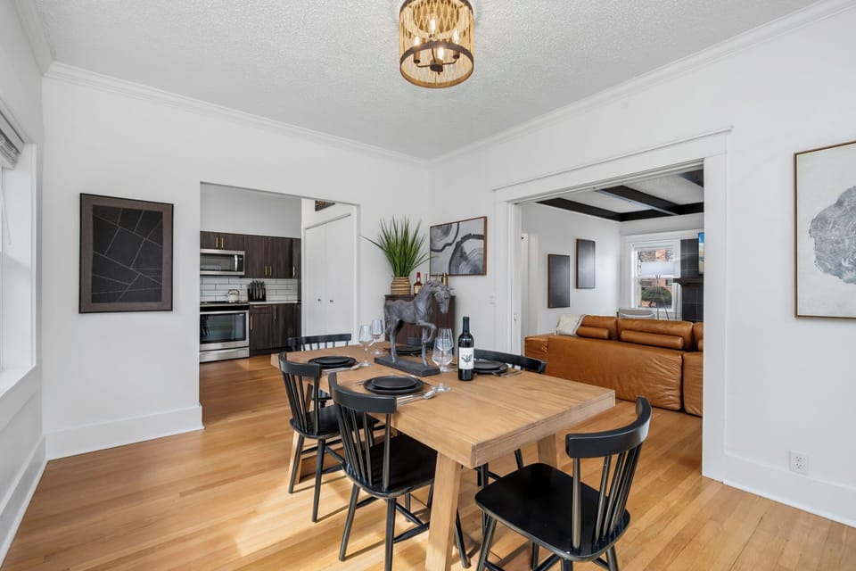 Your open-concept dining space flows seamlessly into the living area, perfect for intimate meals and conversations with loved ones.