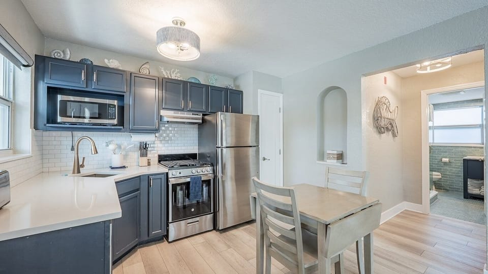 Cook fresh meals in the sleek kitchen, then dine together