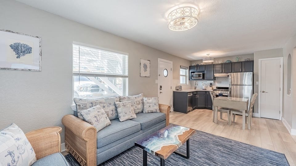 Stretch out together in airy living space near the kitchen