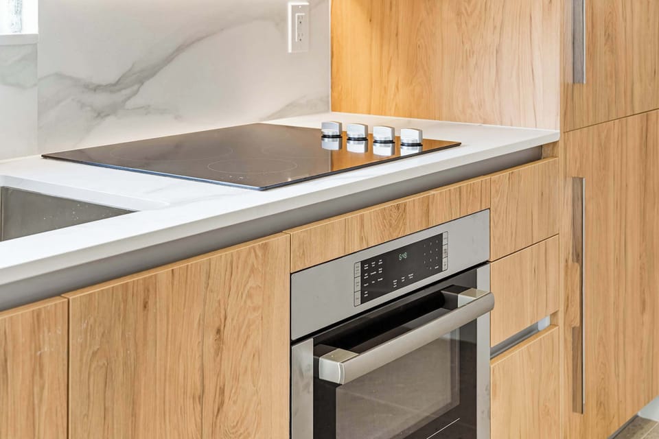 Fully integrated kitchen appliances and sleek finishes