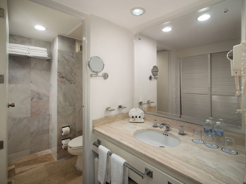 Luxury | Bathroom | Shower, rainfall showerhead, hair dryer, towels