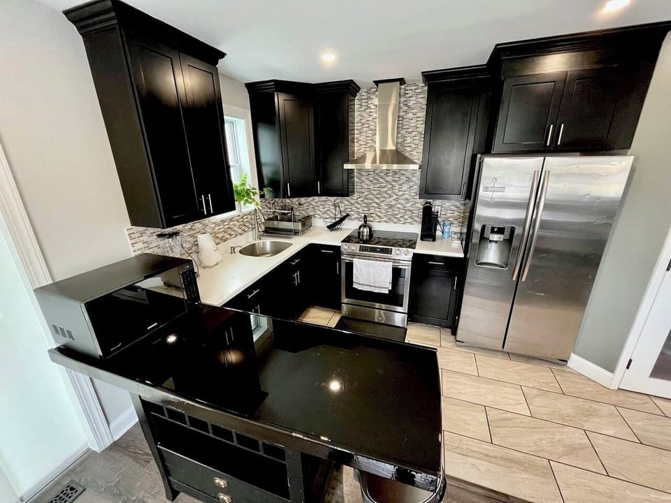 Fully equipped kitchen with cofee station and essential spices included.