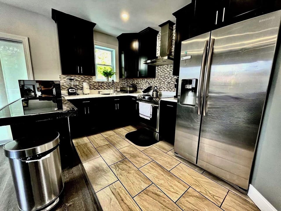 Fully equipped kitchen with all essentials for cooking and dining. 