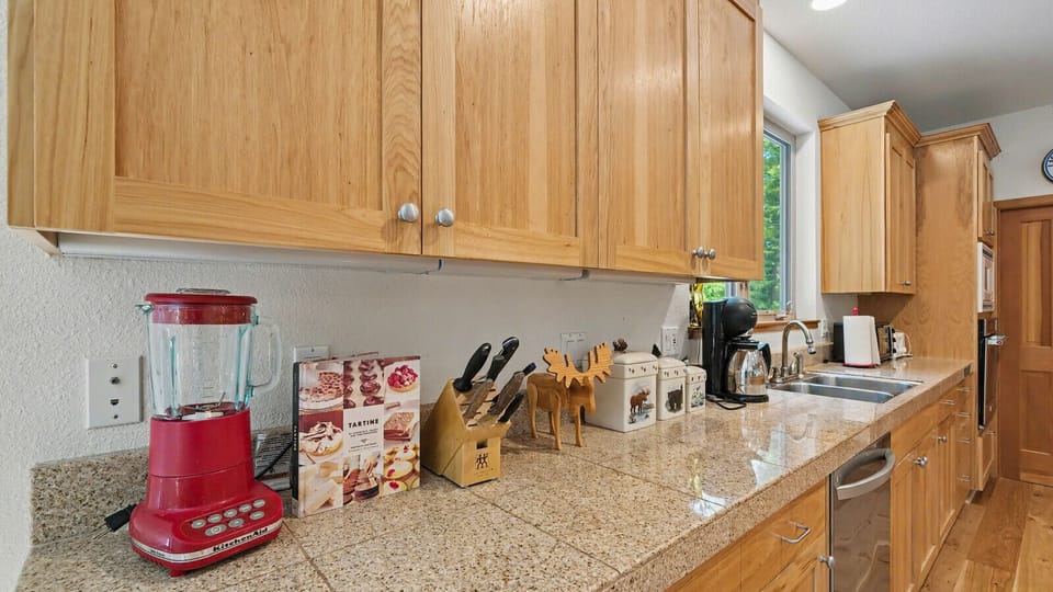 Well appointed kitchen has everything you need to make a perfect meal