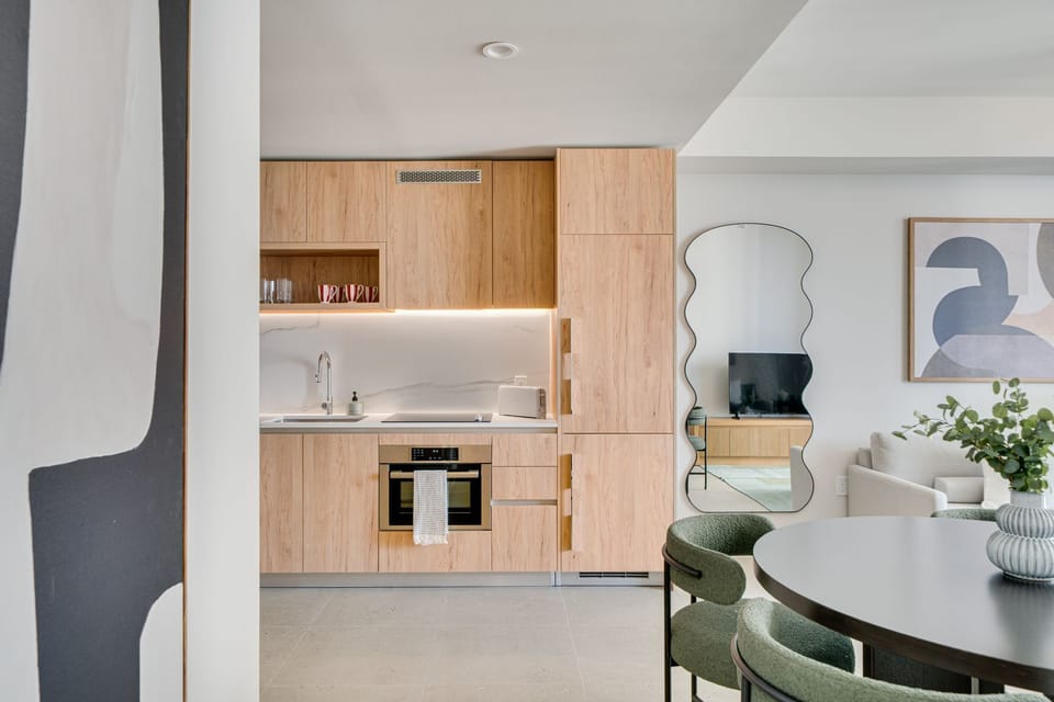 Kitchen with dining nook and modern finishes.