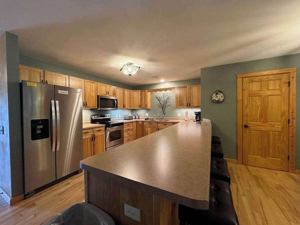 Townhome, Multiple Beds, Patio (Minocqua Lk Condo B7) | Private kitchen