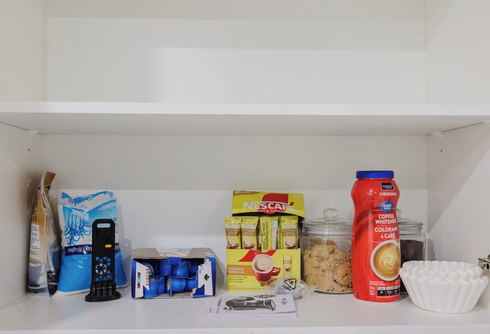 The kitchen includes appliances, cookware, dishes, utensils & free coffee& tea