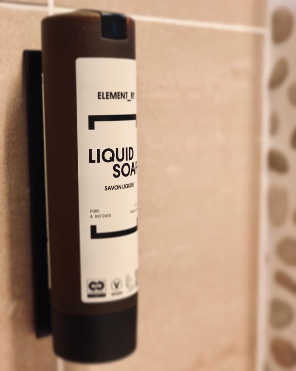 Shower, hair dryer, soap, shampoo