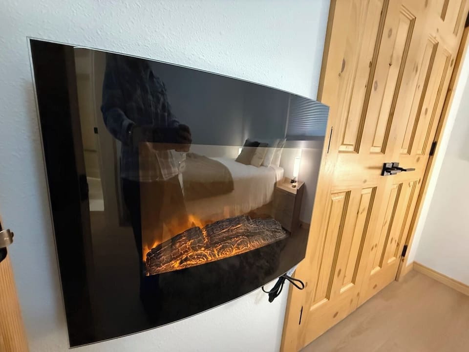 Your own fireplace so you can create ambiance and warmth to your liking.