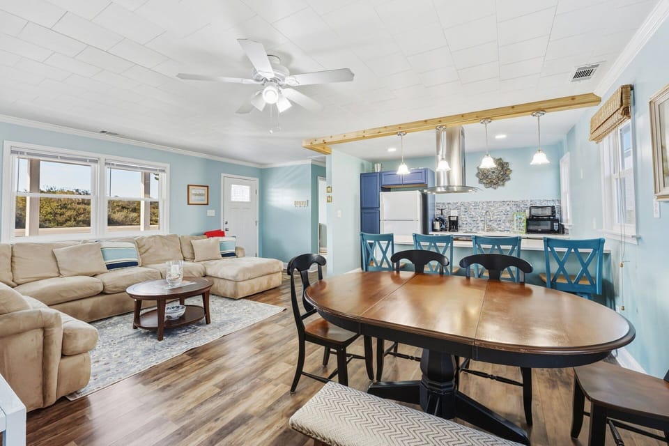 This bright and welcoming space is perfect for movie nights, family gatherings, and unwinding together.