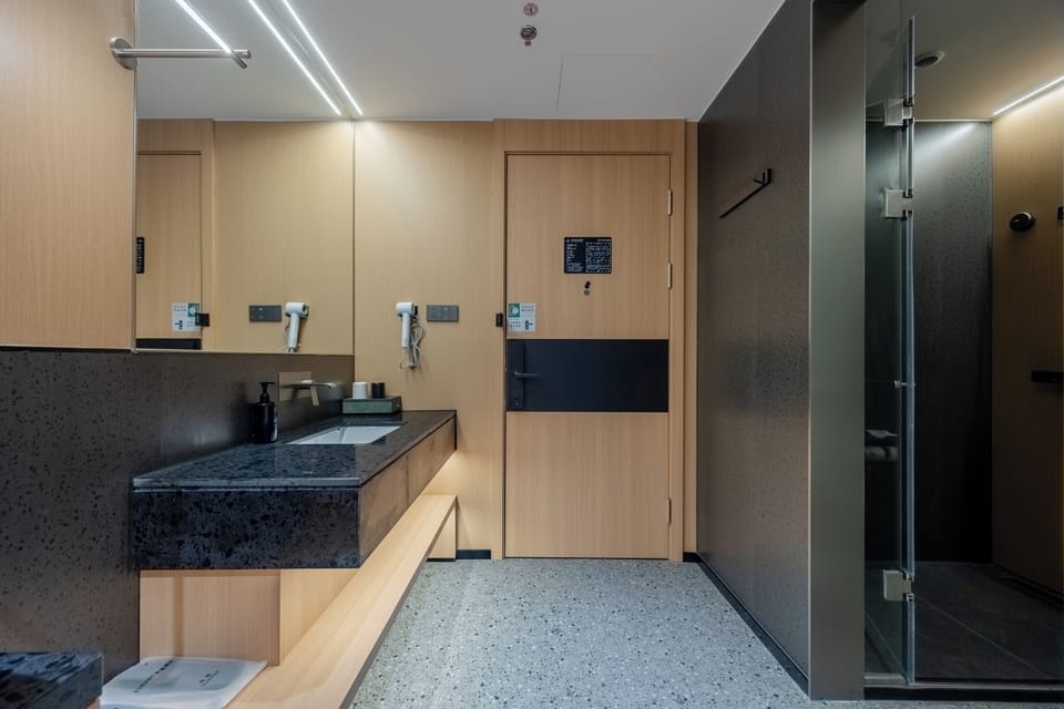 Basic Twin Room, City View | Bathroom | Shower, hair dryer, slippers, towels