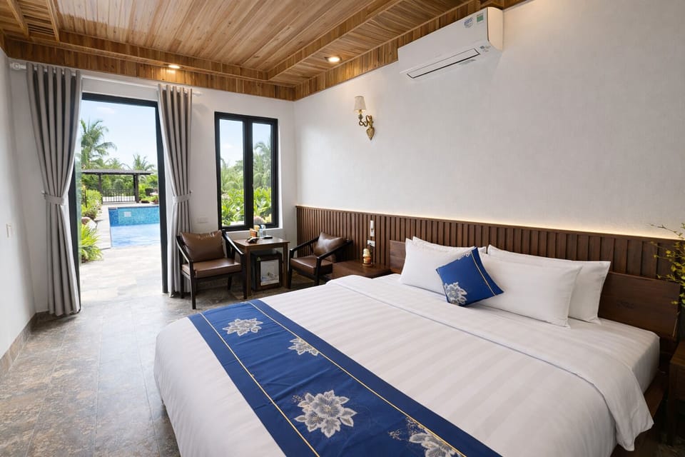 Deluxe Room, Garden View | Desk, blackout drapes, free WiFi, bed sheets