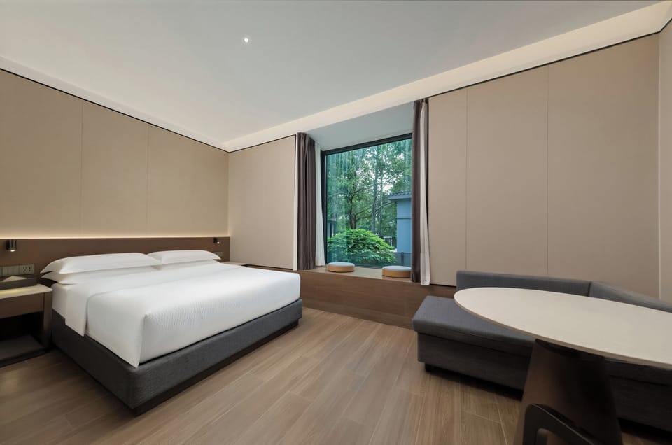 Comfort Double Room, Courtyard View | Desk, laptop workspace, blackout drapes, soundproofing