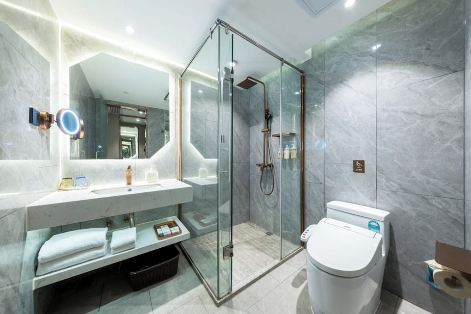Superior Twin Room, No Windows | Bathroom | Shower, free toiletries, hair dryer, slippers