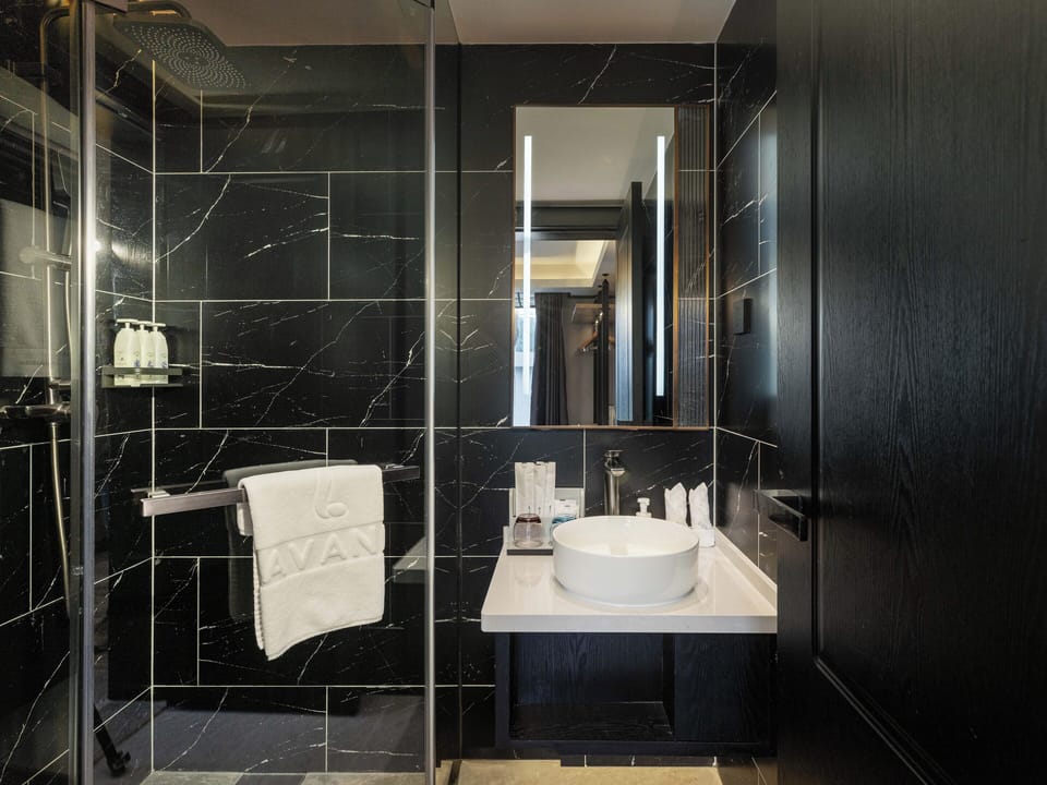 Standard Double Room, City View | Bathroom | Shower, hair dryer, slippers, towels