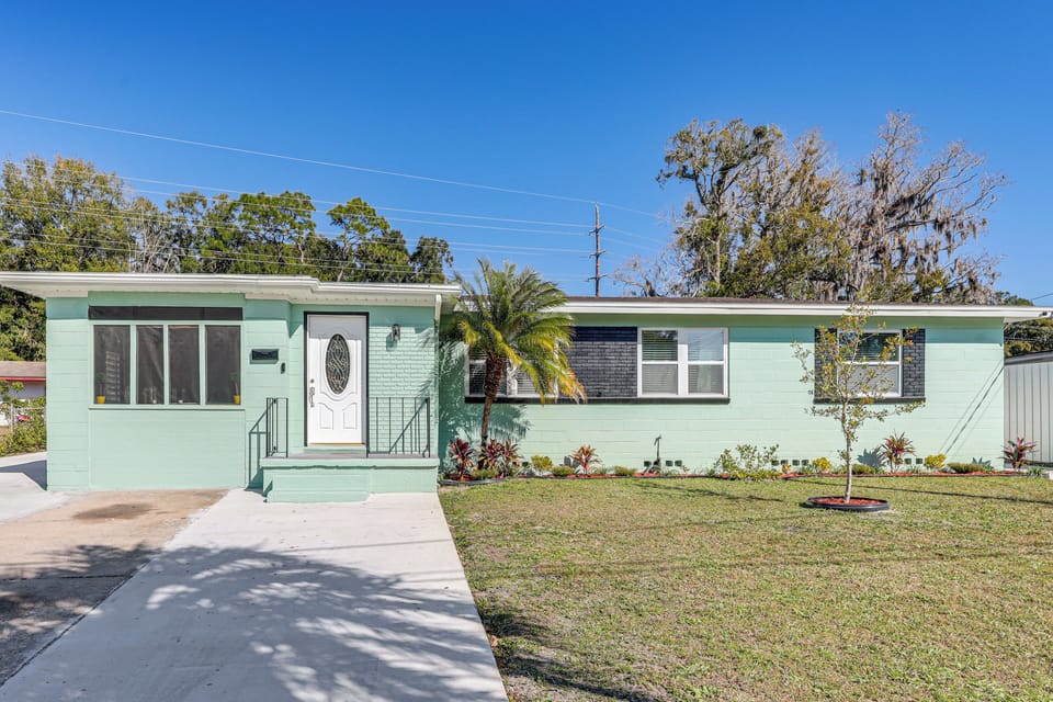 Property Exterior | Screened-In Patio | Wood-Burning Fire Pit | Charcoal Grill
