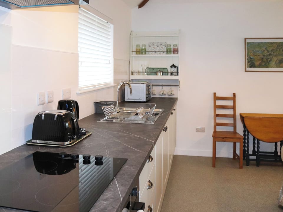 Kitchen area | Ystabl - Chwarel Goch Cottages, Tregarth, near Bangor