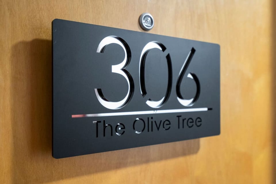 Arrive at apartment 306, The Olive Tree, your home for the stay.