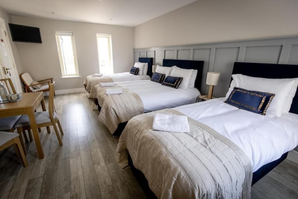 Family Room, Garden View | Blackout drapes, soundproofing, iron/ironing board, free WiFi