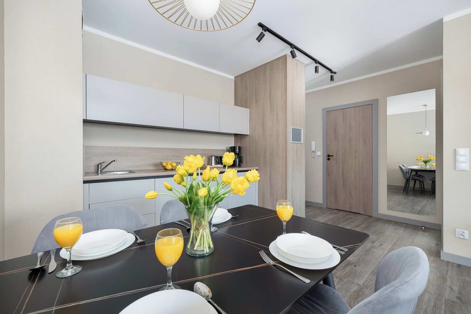 The functional dining area invites shared meals, combining aesthetics with everyday comfort.