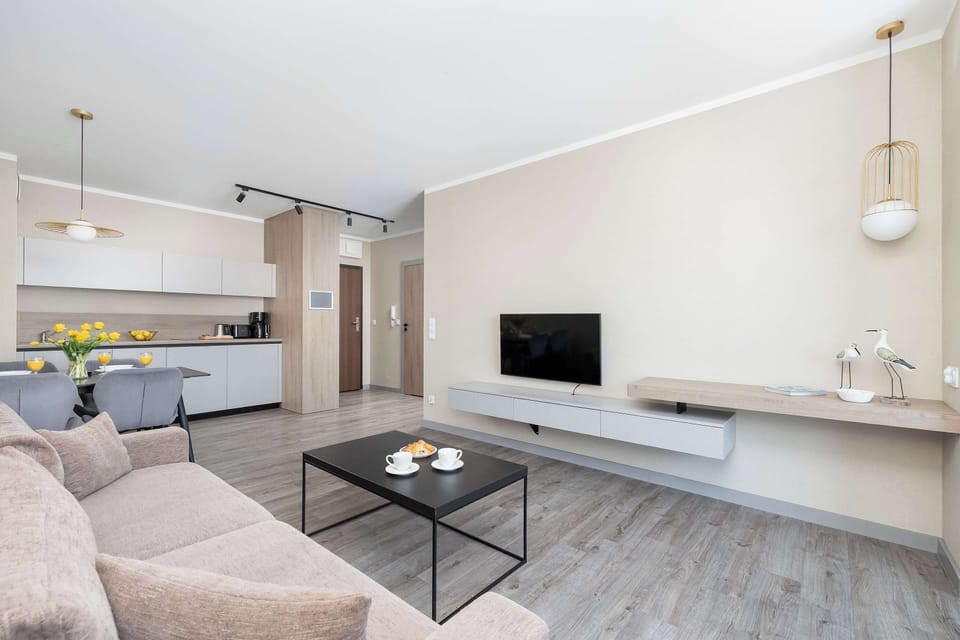 The open living area blends functionality with aesthetics, offering a sense of space and comfort throughout your stay.
