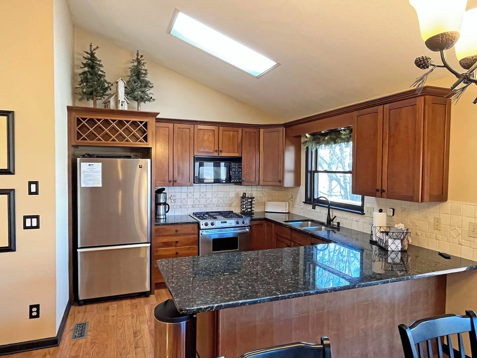 Wonderful, fully equipped Kitchen with stainless steel appliances and plenty of work surface for prepping family meals