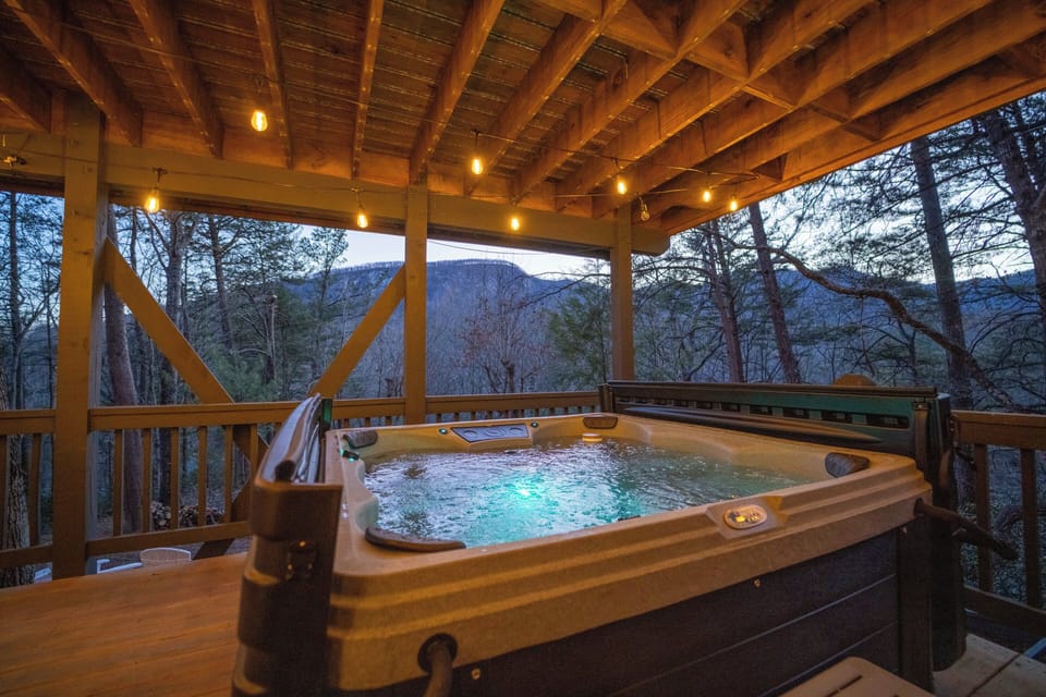 Indulge in the ultimate relaxation by slipping into the private hot tub, considered one of our finest amenities. - Private Hot tub