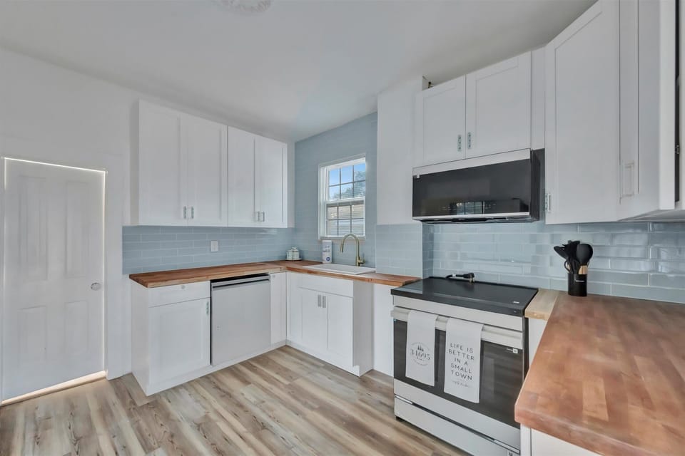 Open kitchen with prep space and storage