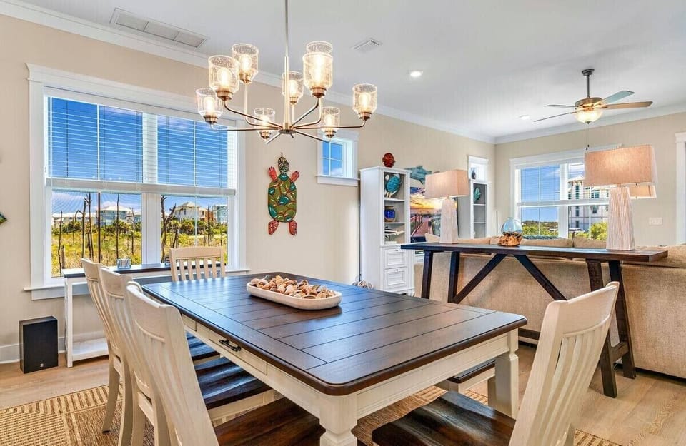 Gather around the large dining table with seating for 8+, ideal for family meals, game nights, and unforgettable conversations.