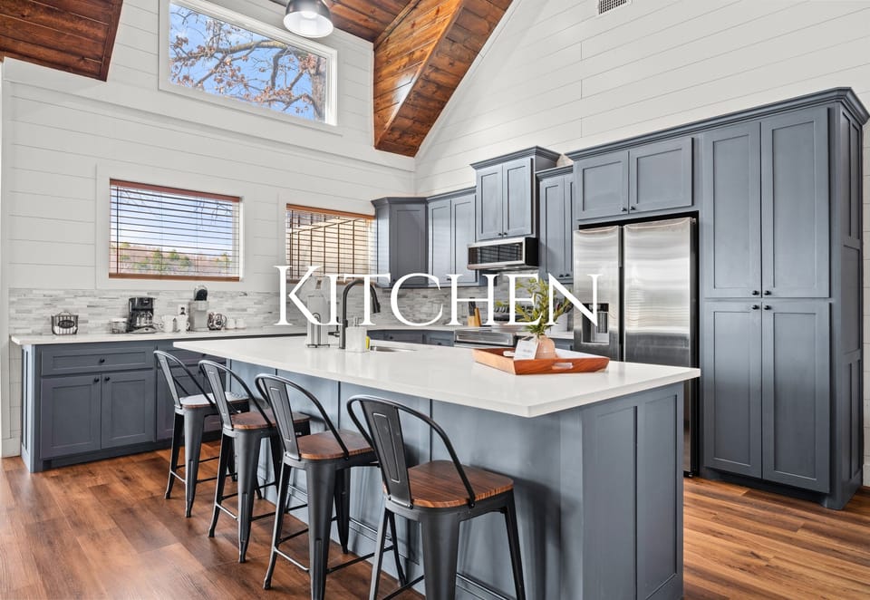 Gathering around the oversized kitchen island is effortless here, whether you’re prepping meals, sharing snacks, or chatting over coffee.