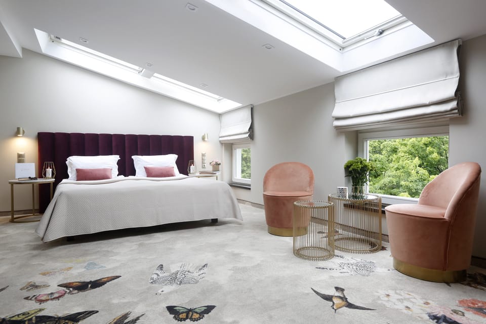 Wake up beneath skylights in a serene, spacious retreat.