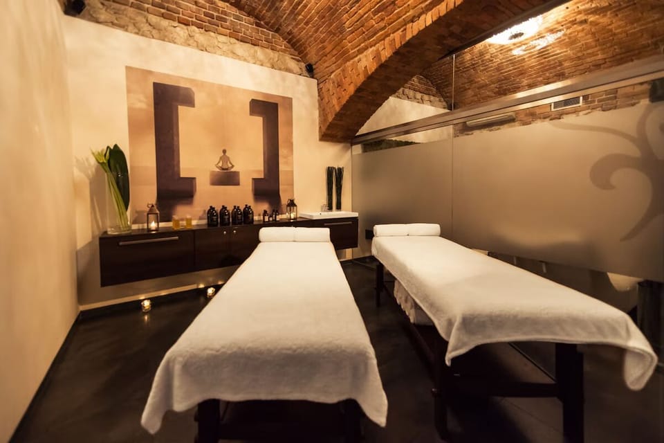 Indulge in side-by-side massages under soothing vaulted ceilings.