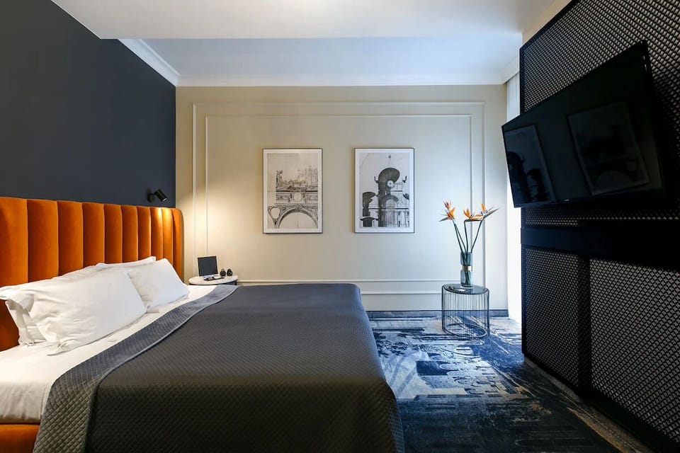 Unwind in a stylish room with bold design accents.