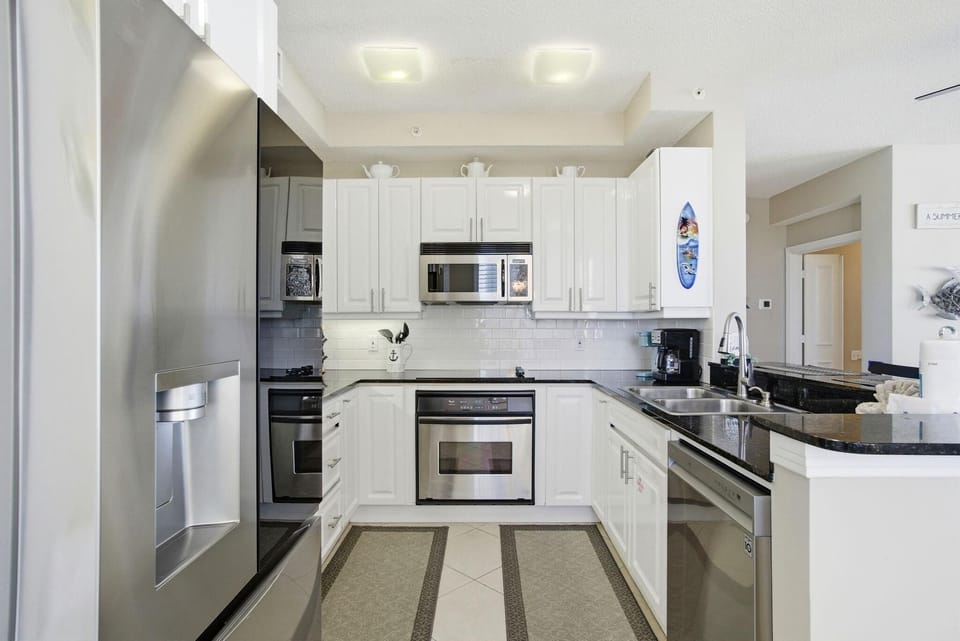 Condo, Multiple Beds (Beach Colony East 8D) | Private kitchen | Oven, toaster