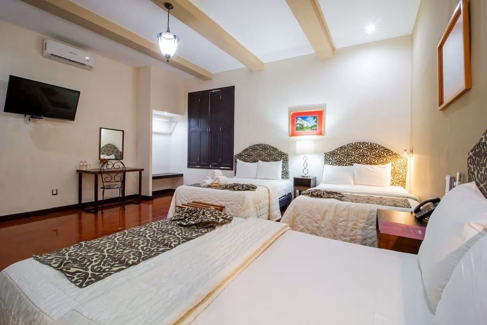 Unwind in a spacious triple-bed room with crisp linens.