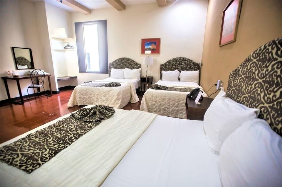 Wake up to daylight spilling across clean, comfortable beds.