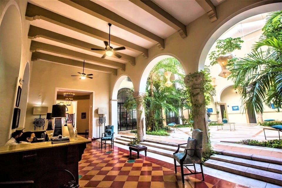 Step into airy arches where the courtyard breeze drifts inside.