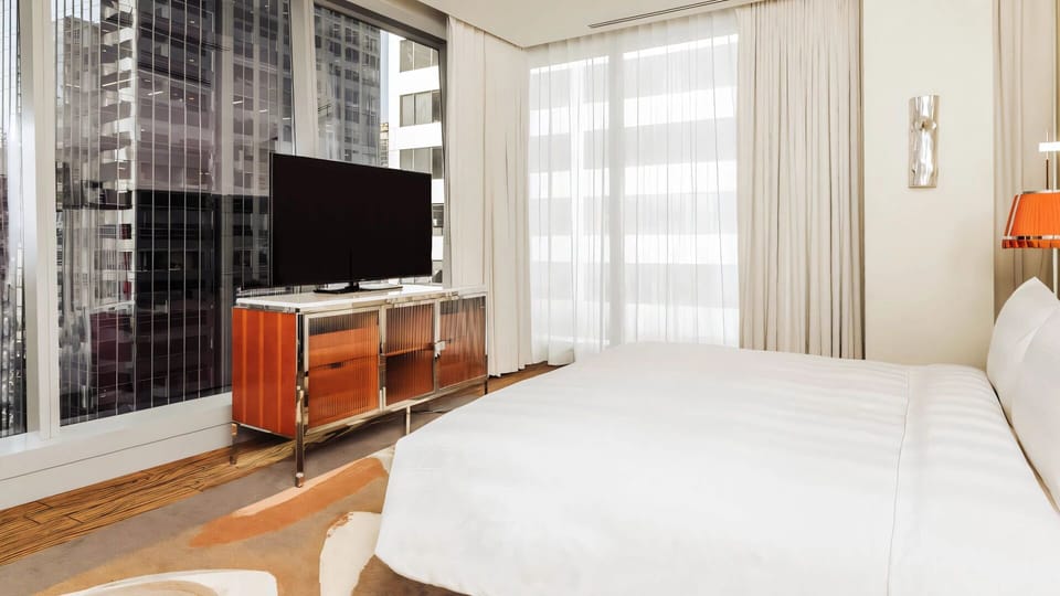 Stretch out after sightseeing with TV comfort and skyline views.