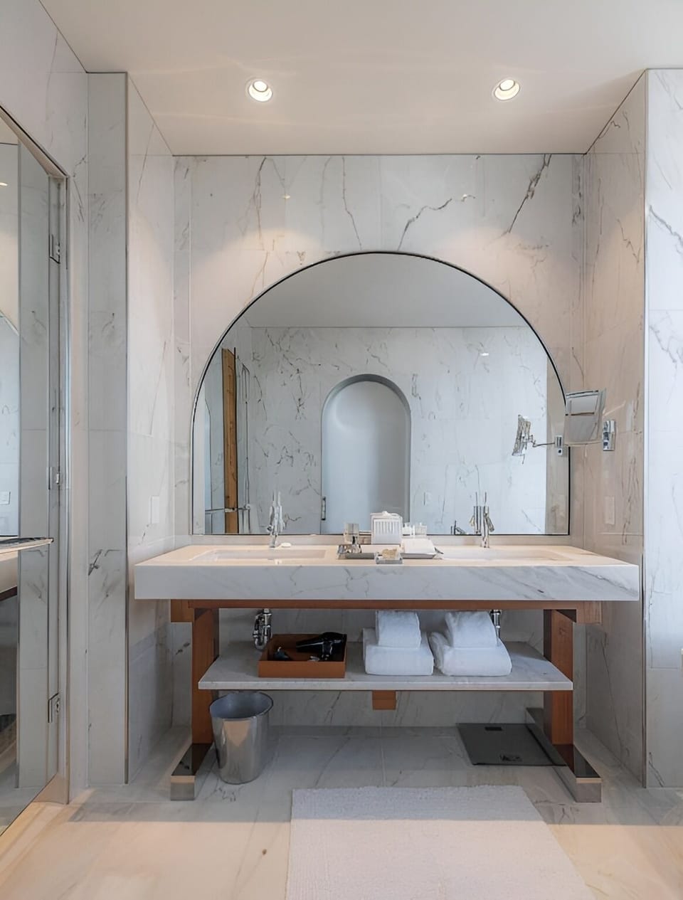 Start your day at a marble vanity under warm lighting.