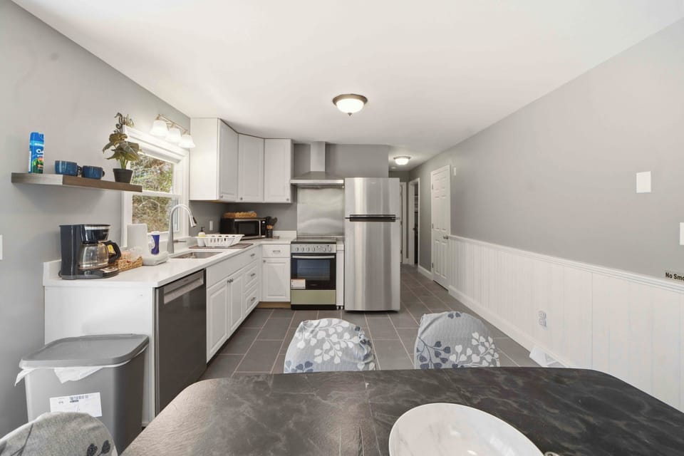 Your fully equipped kitchen awaits with modern appliances, ample counter space, and everything you need to create memorable meals during your stay.