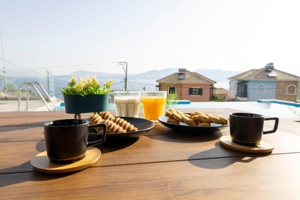 Deluxe Apartment, Balcony, Sea View | Outdoor dining