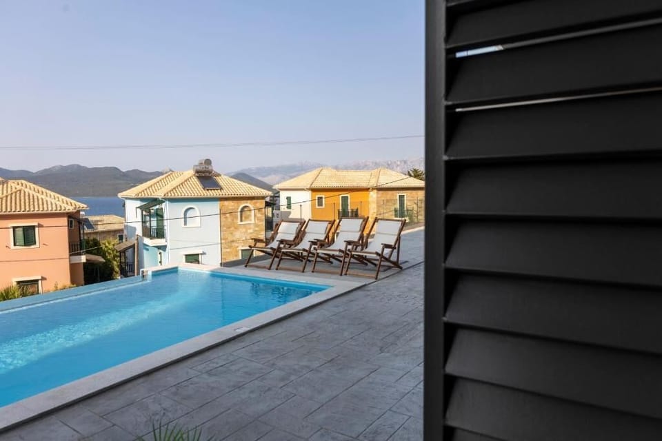 Deluxe Apartment, Balcony, Sea View | Pool | Seasonal outdoor pool