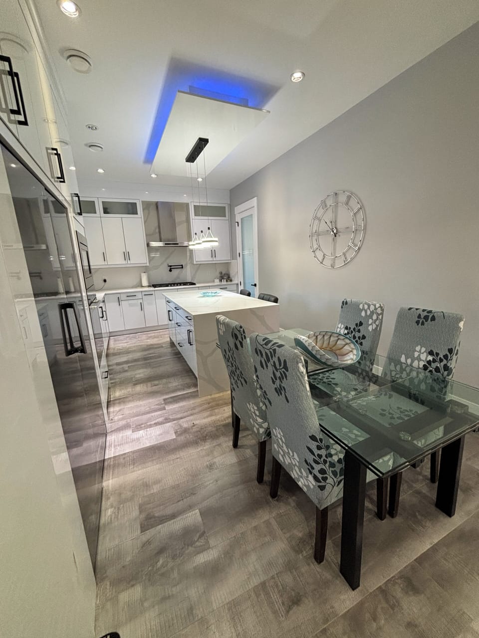 Glass Dining Table that can be expanded to sit 10 guests