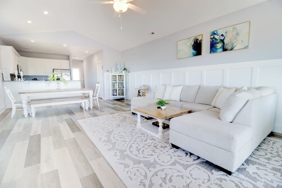 Open, airy living space designed for gathering, lounging, and easy coastal living
