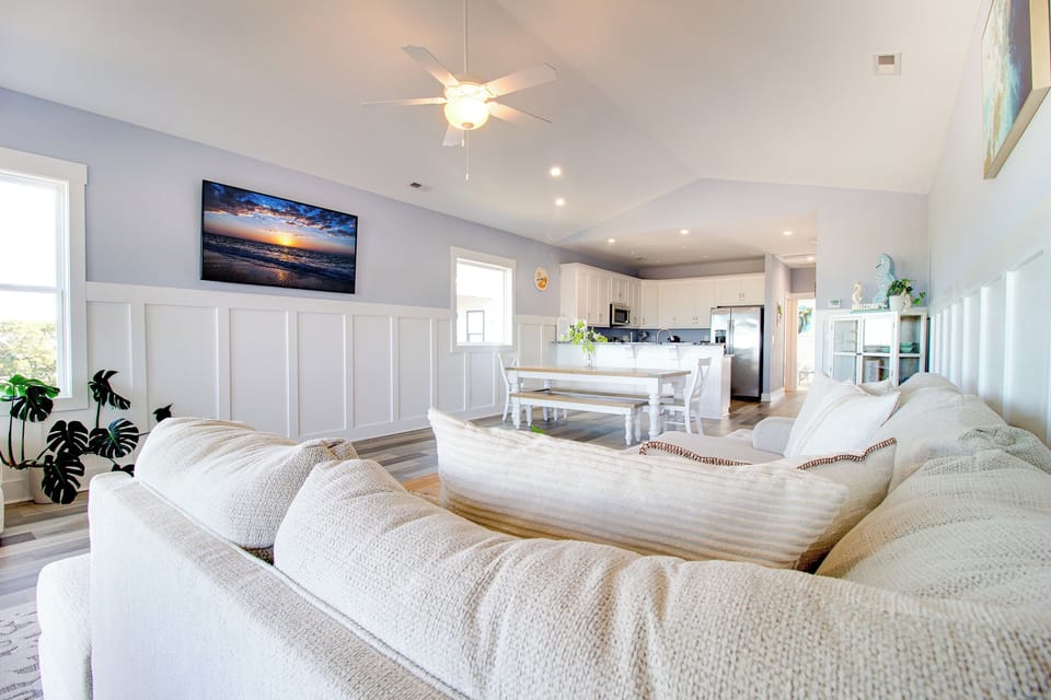 Spacious great room connecting living, dining, and kitchen areas for easy gathering and relaxation