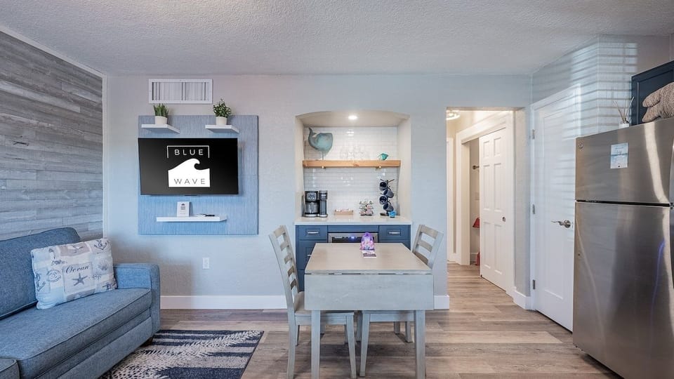 Share meals together at the dining table steps from the kitchen.