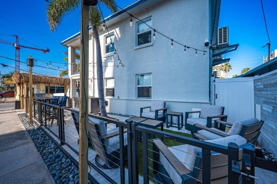 Step into a breezy courtyard made for relaxing together.